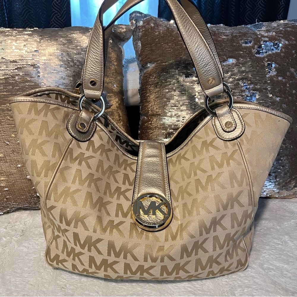 Michael Kors Big tan color with gold